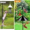image:imageFEED GARDEN Bird Feeder Pole Squirrel Proof 92 Heavy Duty Shepherds Hook for Outdoor Double Hooks with 19 Squirrel Baffle 5Prong Base Adjustable Bird Feeder Stand for Plants amp Lanterns92 Inch PoleBaffle